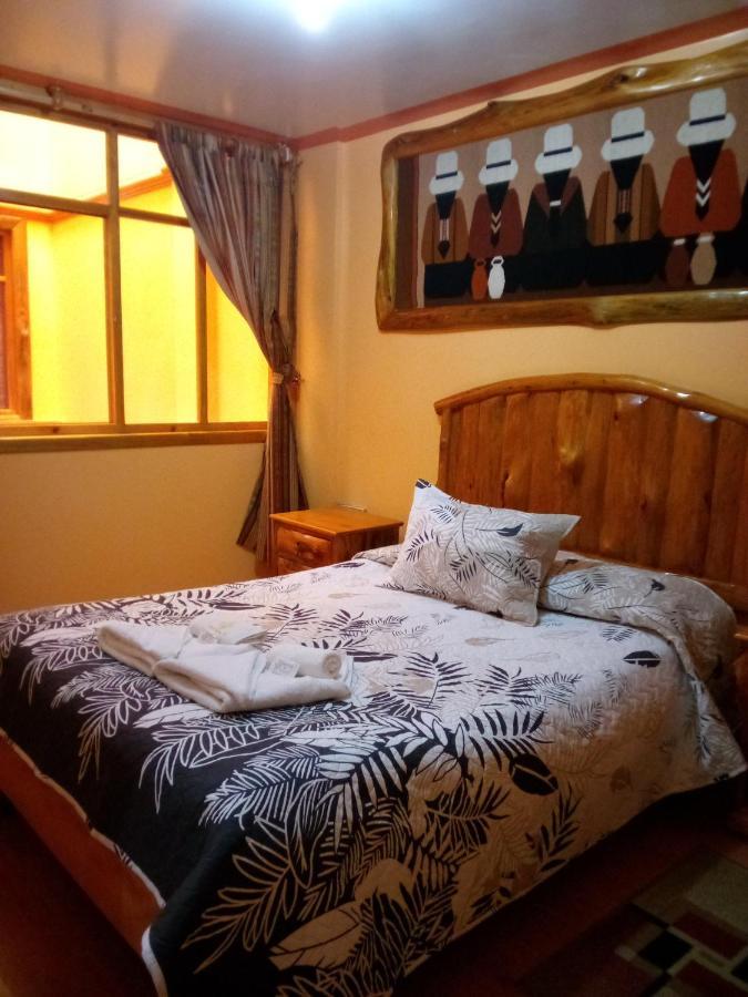Hotel Santafe Inn Отавало Экстерьер фото
